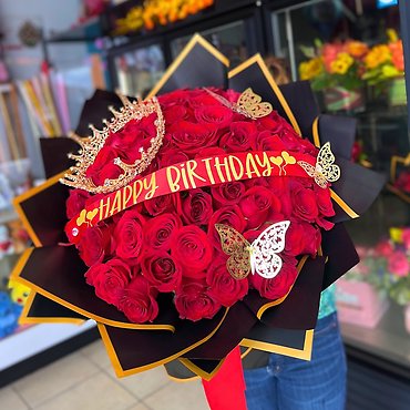 50 ROSES W/CROWN AND RIBBON